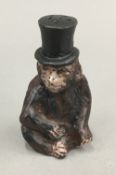 A cold painted bronze monkey form sander