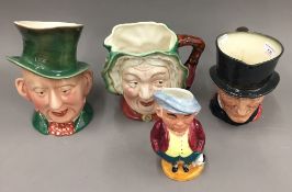 Four various character jugs