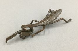 A Japanese bronze model of a locust