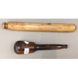 A vintage treen rolling pin and a lignum vitae pestle