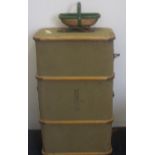 A vintage trunk and a small garden trug