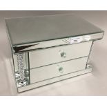 A mirrored and jewelled box