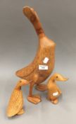 Three Dcuk Company wooden ducks