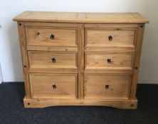 A modern pine chest of drawers