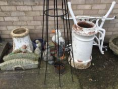 A quantity of garden items, including chimney pots, etc.