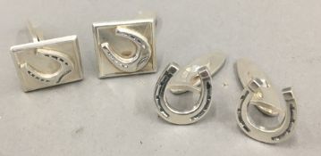 Two pairs of silver horseshoe cufflinks