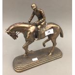 A horse and jockey model