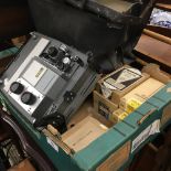 A Consul vintage film projector, together with a quantity of photographic paper, vintage cameras,