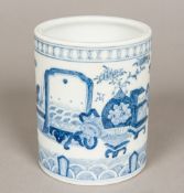 A Chinese blue and white porcelain brush pot Of circular section,