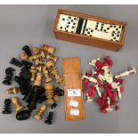 A 19th century carved and stained bone chess set,