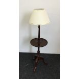A 20th century mahogany standard lamp table