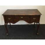 An 18th century style walnut low boy