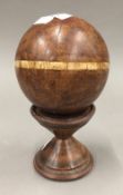A treen ball with bone inlay and a Davilos toy