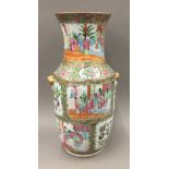 A 19th century large Chinese Canton porcelain vase, well painted with panels of figures,