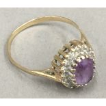 A 9 ct gold amethyst and diamond ring (2.