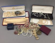 A bag of costume jewellery