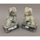 A pair of soapstone dogs-of-fo