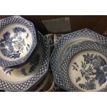 A quantity of blue and white dinner wares