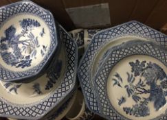 A quantity of blue and white dinner wares