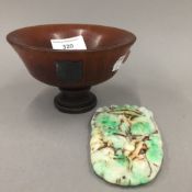 A sterling silver mounted libation cup and a 'jade' carving