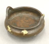 A gold splash miniature censer