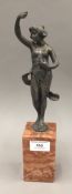 A silvered bronze model of a scantily clad woman