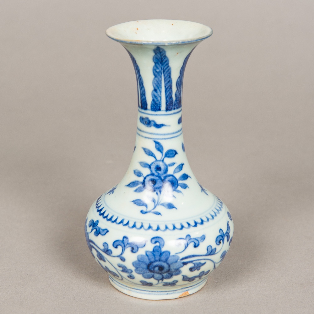 A Chinese blue and white porcelain baluster vase, decorated with floral sprays and lotus strapwork.
