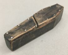 A coffin shaped snuff box,