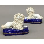 A pair of Chelsea style poodles