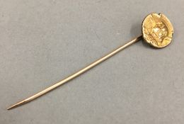 A Continental gold stick pin (1.