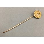 A Continental gold stick pin (1.