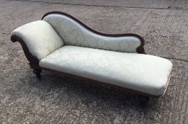 A Victorian mahogany framed chaise longue