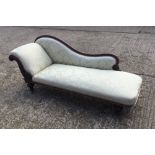 A Victorian mahogany framed chaise longue