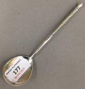 A Russian silver spoon,