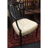 An early 19th century japanned open armchair