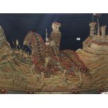 A tapestry wall hanging depicting a soldier on horse back
