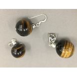 A pair of tiger's eye earrings,