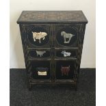 A Chinese stone set lacquered side cupboard