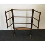 A 19th century mahogany folding clothes airer with under tier