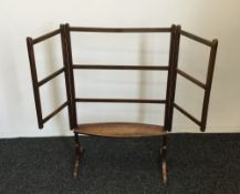 A 19th century mahogany folding clothes airer with under tier