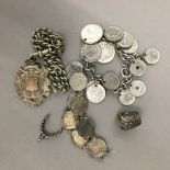 Two coin bracelets,