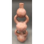 An African triple gourd terracotta vase