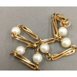 A 9 ct gold and pearl bead bracelet (5 grammes total weight)