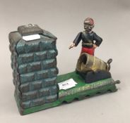 A cast iron artillery money bank