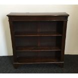 An early 20th century oak open bookcase