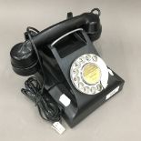 A vintage black telephone