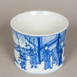 A Chinese blue and white porcelain brush pot, of gently flared circular section,