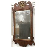 A George III walnut scroll framed mirror,