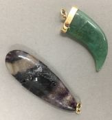 A blue john pendant and a jade pendant