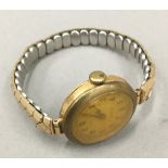 A ladies gold cased Rolex watch